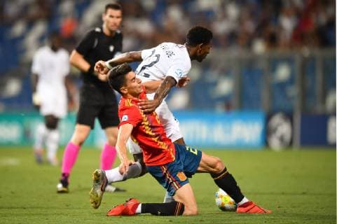 Photo Massimo Paolone LaPresse June 27, 2019 Reggio Emilia, Italy soccer Spain vs France - UEFA Under 21 Championship Italy 2019 - Semi-finals - "Mapei - Citt& xe0; del Tricolore" stadium. In the pic: Jeff Reine Adelaide (Francia) competes for the ball with Marc Roca (Spagna)  Copyright: xMassimoxPaolone LaPressex