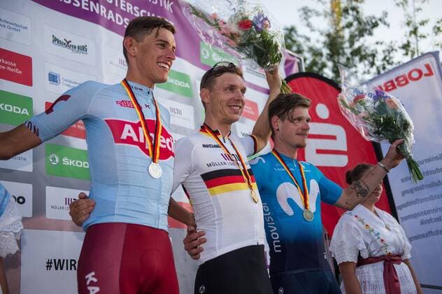 Podium v.l.n.r. (2.) Nils Politt (GER Team Katusha-Alpecin) - (1.) Tony Martin (GER Team Jumbo-Visma) - (3.) Jasha Suettrerlin Sütterlin (GER Movistar Team) - Querformat - quer - horizontal - Event Veranstaltung: Deutsche Meisterschaften - Einzelzeitfahren Strasse - Elite Maenner - Ort Location: Spremberg - Region: Brandenburg - Land Country: Deutschland Germany - Datum Date: 28.06.2019 Cycling Radsport Deutsche Meisterschaften - Einzelzeitfahren Strasse - Elite Maenner 28.06.2019