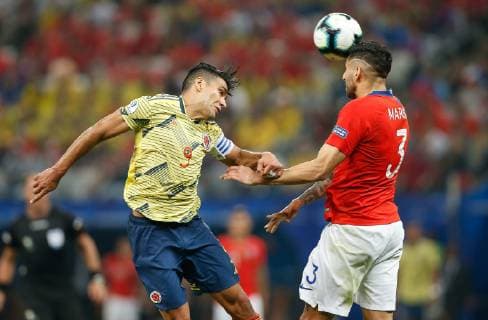 Colombia vs. Chile SÃO PAULO, SP - 28.06.2019: COLOMBIA VS. CHILE - Radamel Falcao Garcia of Colombia contests ball with Guillermo Maripan of Chile during a match between Colombia and Chile, valid for the quarterfinals of the Copa América 2019, held this Friday (28) at the Corinthians Arena in São Paulo, SP. (Photo: Marcelo Machado de Melo Fotoarena) x1754923x  MarceloxMachadoxdexMelo