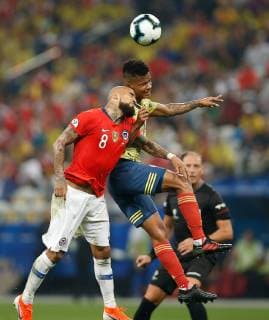 Colombia vs. Chile SÃO PAULO, SP - 28.06.2019: COLOMBIA VS. CHILE - Arturo Vidal of Chile contests ball with William Tesillo of Colombia during a match between Colombia and Chile, valid for the quarterfinals of Copa America 2019, held this Friday (28) at the Corinthians Arena in São Paulo, SP. (Photo: Marcelo Machado de Melo Fotoarena) x1754929x  MarceloxMachadoxdexMelo