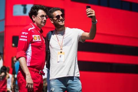 FORMULA 1 - GP of Austria 2019 SPIELBERG,AUSTRIA,30.JUN.19 - MOTORSPORTS, FORMULA 1 - Grand Prix of Austria, Red Bull Ring. Image shows executive director Mattia Binotto (Ferrari) and a fan. GEPAxpictures xDanielxGoetzhaber
