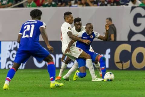 HOUSTON, TX - JUNE 29: players battle for the ball during the Quarterfinals match between Haiti and Canada as part of the 2019 CONCACAF Gold Cup on June 29, 2019, at NRG Stadium in Houston, Texas. (Photo by David Buono Icon Sportswire) SOCCER: JUN 29 CONCACAF Gold Cup Quarterfinals - Haiti v Canada Icon190629048
