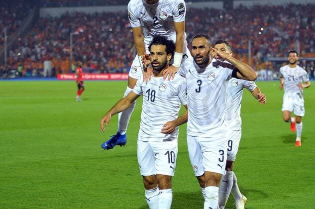 Mohamed salah and his team-mate celebrate the goal he scored on a majestic free-kick during the Match Egypt vs Uganda Group A Total Africa Cup of Nations Egypt 2019 at Cairo International Stadium.photo: Chokri Mahjoub Total Africa Cup of Nations Egypt 2019: Egypt vs Uganda 