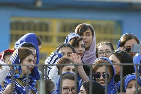 Iranian women sneak into soccer looks at his Esteghlal players ahead of before start the Persian Gulf Pro League 2019 2020,women who are already forbidden from watching the games in stadiums, on Jul 2, 2019, at in Tehran (photographer Amirhossein Kheirkhah) 