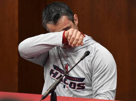 Sport Themen der Woche KW27 Sport Bilder des Tages Los Angeles Angels manager Brad Ausmus wipes a tear as he talks about the death of pitcher Tyler Skaggs during a pregame press conference, PK, Pressekonferenz at Globe Life Park in Arlington, Texas on July 2, 2019. Skaggs, 27, was found dead at a North Texas hotel Monday while the team is in town for a series against the Texas Rangers. No foul play is suspected and the teams postponed Monday s game.  ARL2019070204 IANxHALPERIN