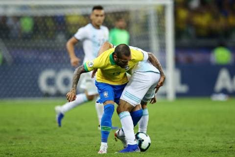 July 2nd 2019, Mineirao, Belo Horizonte, Brazil; Copa America International football, semi final, Brazil versus Argentina; Daniel Alves of Brazil challenged by Marcos Acu& xf1;a of Argentina  ActionPlus12150077 HeulerxAndrey