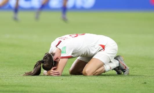(190703) -- LYON, July 3, 2019 -- Jill Scott of England keels on the pitch after the semifinal between the United States and England at the 2019 FIFA Women s World Cup at Stade de Lyon in Lyon, France on July 2, 2019. ) (SP)FRANCE-LYON-FOOTBALL-FIFA WOMEN S WORLD CUP-SEMIFINALS-ENG VS USA XuxZijian 