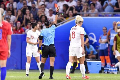 (190703) -- LYON, July 3, 2019 -- Millie Bright (R, front) of England receives a red card due to a double yellow card during the semifinal between the United States and England at the 2019 FIFA Women s World Cup at Stade de Lyon in Lyon, France on July 2, 2019. ) (SP)FRANCE-LYON-FOOTBALL-FIFA WOMEN S WORLD CUP-SEMIFINALS-ENG VS USA ChenxYichen 