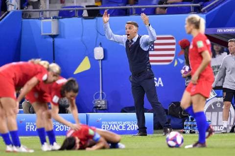 (190703) -- LYON, July 3, 2019 -- Head Coach of England Philip Neville (C) reacts during the semifinal between the United States and England at the 2019 FIFA Women s World Cup at Stade de Lyon in Lyon, France on July 2, 2019. ) (SP)FRANCE-LYON-FOOTBALL-FIFA WOMEN S WORLD CUP-SEMIFINALS-ENG VS USA ChenxYichen 