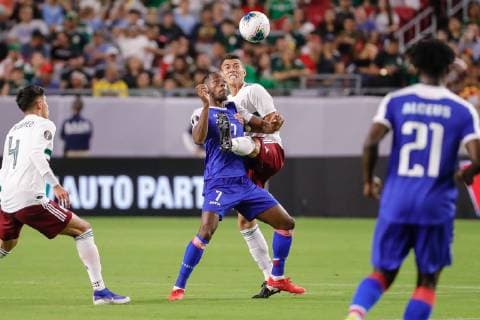 GLENDALE, AZ - JULY 02: Haiti forward Herve Bazile (7) and Mexico defender Hector Moreno (15) fight to control the ball during the CONCACAF Gold cup semifinal soccer game between Haiti and Mexico on July 2, 2019 at State Farm Stadium in Glendale, Arizona. (Photo by Kevin Abele Icon Sportswire) SOCCER: JUL 02 CONCACAF Gold Cup Semifinals - Haiti v Mexico Icon190702027