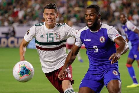 GLENDALE, AZ - JULY 02: Mexico defender Hector Moreno (15) and Haiti forward Duckens Nazon (9) fight to control the ball during the CONCACAF Gold cup semifinal soccer game between Haiti and Mexico on July 2, 2019 at State Farm Stadium in Glendale, Arizona. (Photo by Kevin Abele Icon Sportswire) SOCCER: JUL 02 CONCACAF Gold Cup Semifinals - Haiti v Mexico Icon190702039