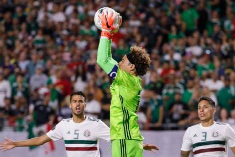 GLENDALE, AZ - JULY 02: Mexico goalkeeper Guillermo Ochoa (13) makes a save during the CONCACAF Gold cup semifinal soccer game between Haiti and Mexico on July 2, 2019 at State Farm Stadium in Glendale, Arizona. (Photo by Kevin Abele Icon Sportswire) SOCCER: JUL 02 CONCACAF Gold Cup Semifinals - Haiti v Mexico Icon190702047