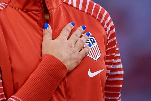 LYON, FRANCE - JULY 02: Detail of Alex Morgan s of USA hand on the team badge during the national anthem prior to the 2019 FIFA Women s World Cup France Semi Final match between England and USA at Stade de Lyon on July 2, 2019 in Lyon, France. (Photo by David Aliaga) WCS, WOM, SPO  Copyright: xDavidxAliaga