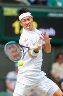 Kei Nishikori of Japan during the men s singles quarter-final match of the Wimbledon Lawn Tennis Championships against Roger Federer of Switzerland at the All England Lawn Tennis and Croquet Club in London, England on July 10, 2019.  (107695262)