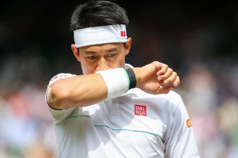 Kei Nishikori of Japan during the men s singles quarter-final match of the Wimbledon Lawn Tennis Championships against Roger Federer of Switzerland at the All England Lawn Tennis and Croquet Club in London, England on July 10, 2019.  (107695270)