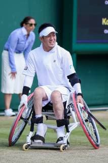 Koji Sugeno of Japan during the quad wheelchair singles semi-final match of the Wimbledon Lawn Tennis Championships against Dylan Alcott of Australia at the All England Lawn Tennis and Croquet Club in London, England on July 11, 2019.  (107759591)