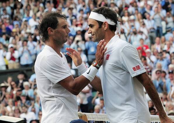 Sport Themen der Woche KW28 Sport Bilder des Tages Tennis - 2019 Wimbledon Championships - Week Two, Friday (Day Eleven) Men s Singles, Semi-Final: Rafael Nadal (ESP) v Roger Federer (SUI) Rafael Nadal congratulates Roger Federer after the match on Centre Court. COLORSPORT ANDREW COWIE 