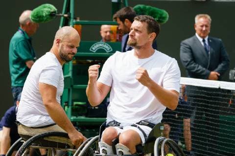 Belgian Joachim Gerard (R) and Swedish Stefan Olsson celebrate as they won the final of the men s wheelchair doubles final against British pair Alfie Hewitt and Gordon Reid at the 2019 Wimbledon grand slam tennis tournament at the All England Tennis Club, in south-west London, Britain, Saturday 13 July 2019. PETERxVANxDENxBERG  x05625367x