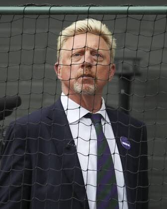Sport Bilder des Tages TV Kommentator Boris Becker steht hinter einem Zaun am Centre Court Tennis - Wimbledon 2016 - Grand Slam ITF ATP, Tennis Herren WTA, Tennis Damen - AELTC - London - - Great Britain - 14 July 2019. Copyright: xJuergenxHasenkopfx