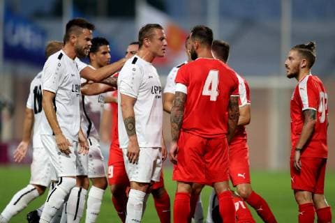 F91 Dudelange captain Tom Schnell (2nd L) and Valletta FC captain Steve Borg (2nd R) in a heated moment during the UEFA Champions League, First Qualifying Round, 2nd leg match between the two teams at the Centenary Stadium, Ta Qali, Malta on 16 July, 2019. Valletta FC v Dudelange UCL_19_20