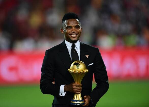 (190720) -- CAIRO, July 20, 2019 -- Cameroonian football star Samuel Eto o presents the trophy before the 2019 Africa Cup of Nations final match between Senegal and Algeria in Cairo, Egypt on July 19, 2019. Algeria won 1-0 and claimed the title. ) (SP)EGYPT-CAIRO-SOCCER-AFRICA CUP OF NATIONS-FINAL-SENEGAL VS ALGERIA WuxHuiwo 