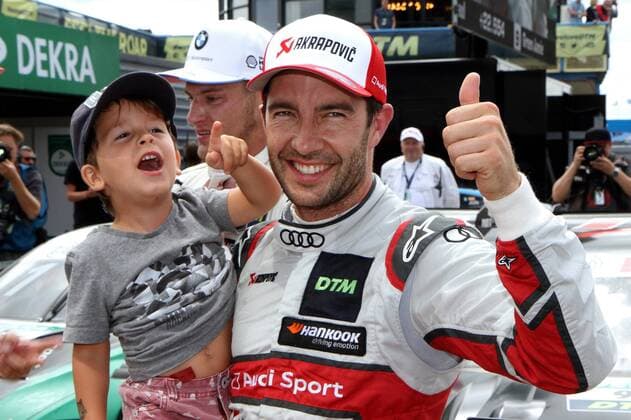 Sport Bilder des Tages Mike Rockenfeller (GER) (Audi Team Phoenix - Audi RS5 DTM) freut sich über seinen Sieg beim DTM-Lauf auf dem TT Circuit Assen (NL). Copyright Thomas Pakusch *** Mike Rockenfeller GER Audi Sport Team Phoenix Audi RS5 DTM is happy about his victory at the DTM race at the TT Circuit Assen NL Copyright Thomas Pakusch