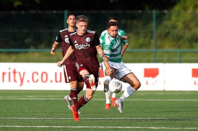 Copenhagen s Jens Stage (left) and The New Saints Ryan Brobbel battle for the ball during the UEFA Champions League second qualifying round first leg match at Park Hall Stadium, Oswestry. , Oswestry Denmark