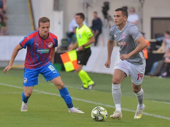 From left soccer players of JAN KOPIC of Viktoria and OMAR ELABDELLAOUI of Olympiakos in action during the Football Champions League 2nd qualifying round match: Viktoria Plzen vs Olympiakos Piraeus in Pilsen, Czech Republic, July 23, 2019. (CTKxPhoto MiroslavxChaloupka) CTKPhotoP201907230863401  _CHA8560