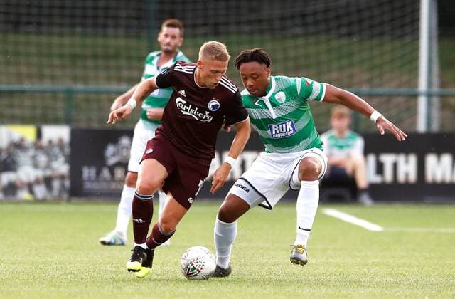 Copenhagen s Viktor Fischer (left) and The New Saints Joash Nembhard battle for the ball during the UEFA Champions League second qualifying round first leg match at Park Hall Stadium, Oswestry. , Oswestry Denmark
