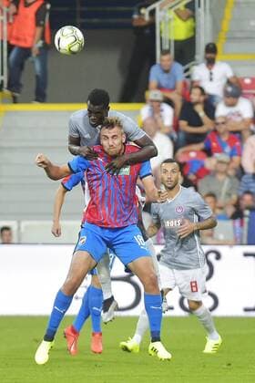 L-R Ousseynou Ba (Olympiakos) and Tomas Chory (Plzen) in action during the Football Champions League 2nd qualifying round match: Viktoria Plzen vs Olympiakos Piraeus in Pilsen, Czech Republic, on July 23, 2019. (CTKxPhoto MiroslavxChaloupka) CTKPhotoP201907230958101  cha014