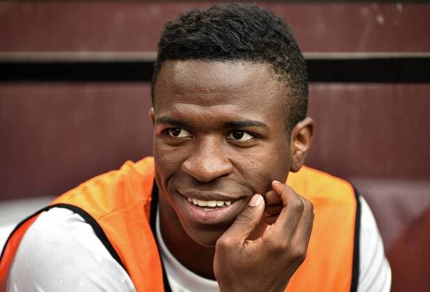 LANDOVER, MD - JULY 23: Real Madrid forward Vinicius Jr. (28) (Vinicius Paixao de Oliveira Junior) smiles while watching from the bench during the Real Madrid versus Arsenal International Champions Cup game on July 23, 2019 at FedEx Field in Landover, MD.. (Photo by Randy Litzinger Icon Sportswire) SOCCER: JUL 23 International Champions Cup - Real Madrid v Arsenal Icon9661907230082
