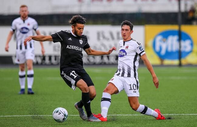 UEFA Champions League Second Qualifying Round First Leg, Oriel Park, Co. Louth 24 7 2019 Dundalk vs Qarabag Dundalk s Jamie McGrath with Abdellah Zoubir of Qarabag Jamie McGrath with Abdellah Zoubir 24 7 2019  Copyright: x©INPHO RyanxByrnex RB3_4889