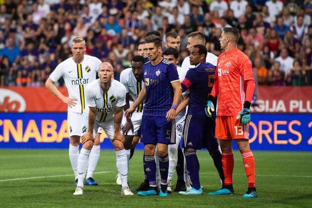 190724 Per Karlsson and Henok Goitom of AIK beside Blaz Vrhovec and goalkeeper Kenan Piric of Maribor during the UEFA Champions League qualifying match between Maribor and AIK on July 24, 2019 in Maribor. Photo: Martin Metelko BILDBYRAN Cop 277 bbeng fotball fotboll football kval till champions league soccer champions league qualification aik maribor Copyright: MARTINxMETELKO BB190724BB366