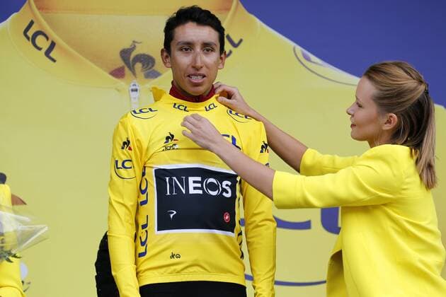 Colombian Egan Bernal of Team Ineos celebrates on the podium in the yellow jersey of leader in the overall ranking after stage 19 of the 106th edition of the Tour de France cycling race, from Saint-Jean-de-Maurienne to Tignes (126,5 km), France, Friday 26 July 2019. This year s Tour de France starts in Brussels and takes place from July 6th to July 28th. FRANCE OUT YUZURUxSUNADA  x05633821x