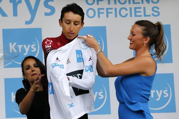 Colombian Egan Bernal of Team Ineos celebrates on the podium in the white jersey for best young rider after stage 19 of the 106th edition of the Tour de France cycling race, from Saint-Jean-de-Maurienne to Tignes (126,5 km), France, Friday 26 July 2019. This year s Tour de France starts in Brussels and takes place from July 6th to July 28th. FRANCE OUT YUZURUxSUNADA  x05633830x