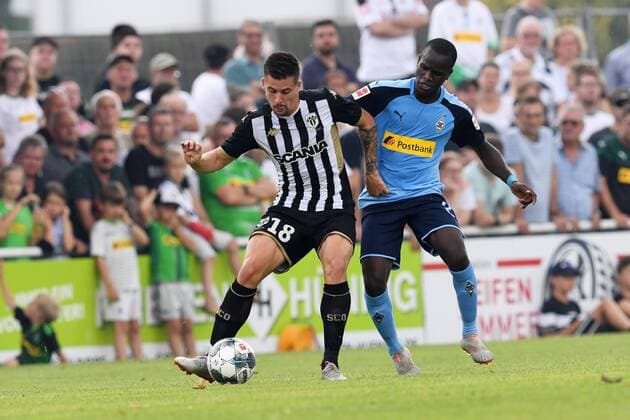 Fussball 1.Bundesliga Saison 2019 2020 Testspiel SCO Angers 1. FC Mönchengladbach 27.07.2019, Stadion an der Römerstrasse, Straelen, Baptiste Santamaria ,SCO Angers Famara Quizera, ,Borussia Mönchengladbach, , DFL regulations prohibit any use of photographs as image sequences and or quasi video.