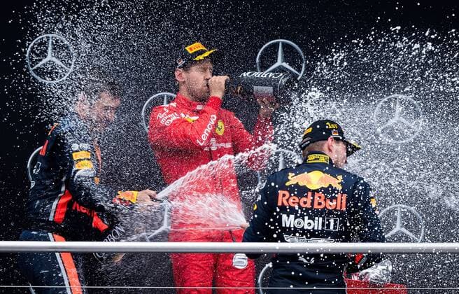 28.07.2019, xpsx, Motorsport FIA Formel 1, Mercedes Benz Großer Preis von Deutschland 2019 Rennen v.l. Siegerehrung, Podium, Jubel, Sebastian Vettel (Scuderia Ferrari Mission Winnow 5 GER), Max Verstappen (Aston Martin Red Bull Racing 33 NED) Hockenheim