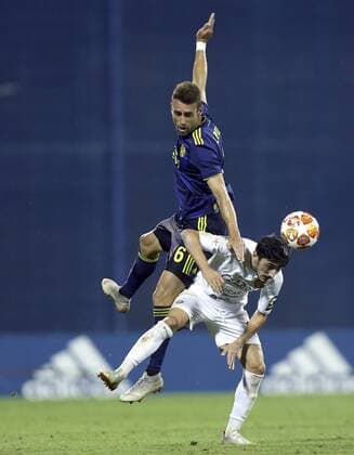 (190731) -- ZAGREB, July 31, 2019 -- Ivo Pinto (L) of GNK Dinamo Zagreb vies with Grigol Chabradze of FC Saburtalo Tbilisi during the second leg of second qualifying round match of UEFA Champions League in Zagreb, Croatia, July 30, 2019. GNK Dinamo won 3-0. ( Pixsell via Xinhua) (SP)CROATIA-ZAGREB-UEFA CHAMPIONS LEAGUE-DINAMO ZAGREB VS SABURTALO TBILISI LukaxStanzl 