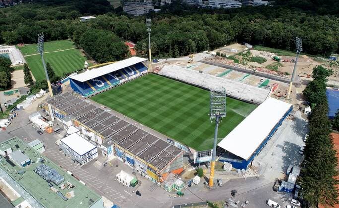 Fußball, Stadiongeschichte SV Darmstadt 98 31.07.2019, xfux, Fussball 2.Bundesliga, SV Darmstadt 98 Luftaufnahme Merck-Stadion am Boellenfalltor Jonathan-Heimes-Stadion am Böllenfalltor, emonline, emspor, deloka, v.l. Ansicht, Uebersicht Merck-Stadion am Boellenfalltor Jonathan-Heimes-Stadion am Böllenfalltor aus der Luft Rasen Innenraum Tribuene Feld Spielfeld Arena Fussballplatz gruen Stehplatz Stehplatztribuene Gegengerade Gegentribuene Nordkurve Suedkurve Südkurve Nordtribuene Nordtribüne Südtribüne Suedtribüne Suedtribuene Südkurve Hauptribüne Hauptribuene Baustelle Gegengerade Bauarbeiten Gelaende Stehblock Stehplaetze Darmstadt
