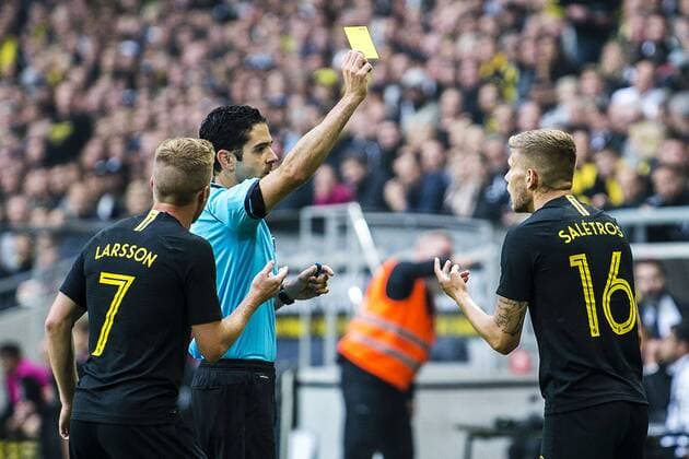 190731 Anton Saletros of AIK gets a yellow card during the UEFA Champions League qualifying match between AIK and Maribor on July 31, 2019 in Stockholm. Photo: Jesper Zerman BILDBYRAN Cop 234 Fotboll Football UEFA Champions League 2019 2020 Champions League qualification CL AIK Maribor Copyright: JESPERxZERMAN BB190731JZ025