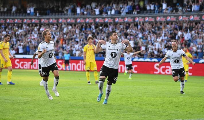 Football UEFA Champions League Q2 Rosenborg - BATE Lerkendal Stadium, Trondheim, Norway 31 July 2019 Pal Andre Helland (midten) har scoret 1-0 for Rosenborg og jubler. Mike Jensen til høyre og Vegar Eggen Hedenstad til venstre Foto : Arve Johnsen, Digitalsport 