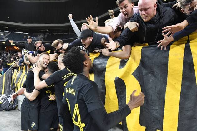 AIK s Tarik Elyounoussi (2ndL) and teammates celebrate with fans after Elyounoussi scored during the UEFA Champions League second qualifying round leg 2 soccer match between AIK and NK Maribor (Slovenia) at Friends Arena in Stockholm, Sweden, on July 31,2019. Stockholm SWEDEN SOCCER x11880x