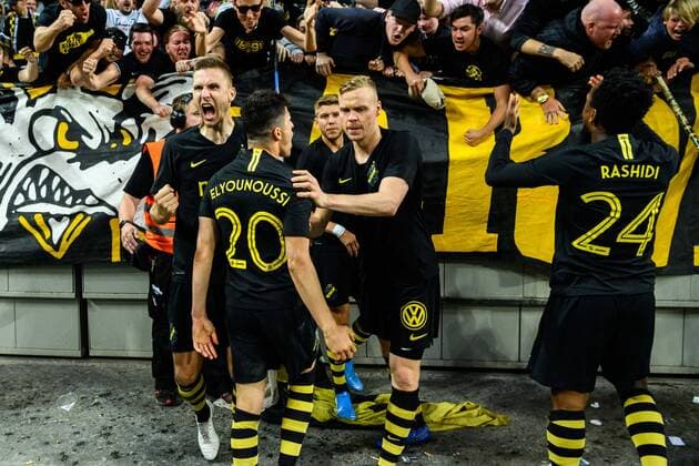 190731 Tarik Elyounoussi of AIK celebrates with teammates after 3-1 during the UEFA Champions League qualifying match between AIK and Maribor on July 31, 2019 in Stockholm. Photo: Jesper Zerman BILDBYRAN Cop 234 fotboll football uefa champions league 2019 2020 champions league qualification cl aik maribor jubel Copyright: JESPERxZERMAN BB190731BB490
