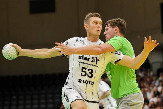 HANDBALL - Allstars vs Kiel, test match GRAZ,AUSTRIA,03.AUG.19 - HANDBALL - Styrian Allstars vs THW Kiel, test match. Image shows Nikola Bilyk (Kiel) and Daniel Dicker (Allstars). GEPAxpictures xChristianxWalgram