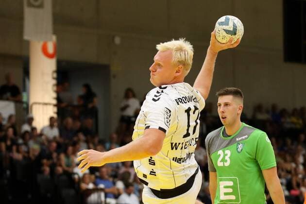 HANDBALL - Allstars vs Kiel, test match GRAZ,AUSTRIA,03.AUG.19 - HANDBALL - Styrian Allstars vs THW Kiel, test match. Image shows Patrick Wiencek (Kiel) and Nemanja Belos (Allstars). GEPAxpictures xChristianxWalgram
