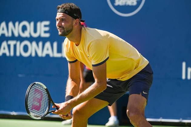 MONTREAL, QC - AUGUST 05: Grigor Dimitrov (BUL) waits for service during the ATP, Tennis Herren Coupe Rogers first round match on August 5, 2019 at IGA Stadium in Montreal, QC (Photo by David Kirouac Icon Sportswire) TENNIS: AUG 05 Coupe Rogers Icon190805077