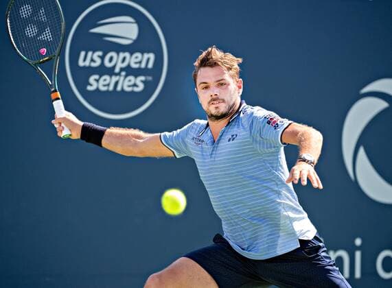 (190806) -- MONTREAL, Aug. 6, 2019 (Xinhua) -- Stan Wawrinka of Switzerland returns the ball during the first round of men s singles match against Grigor Dimitrov of Bulgaria at the 2019 Rogers Cup in Montreal, Canada, Aug. 5, 2019. (Xinhua Andrew Soong) (SP)CANADA-MONTREAL-TENNIS-ROGERS CUP-MEN S SINGLES 