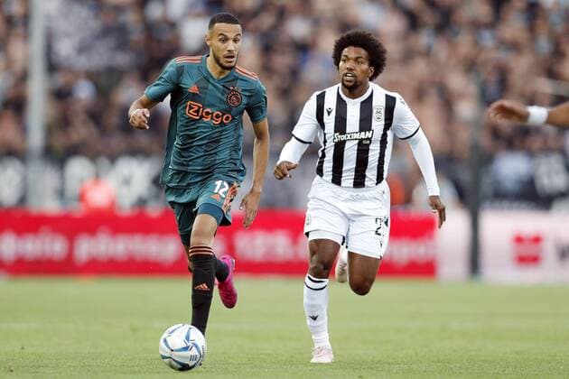 Fußball, CL-Quali, PAOK Saloniki - Ajax Amsterdam (l-r) Noussair Mazraoui of Ajax, Diego Biseswar of PAOK FC during the UEFA Champions League third round qualifying first leg match between PAOK FC and Ajax Amsterdam at Toumba stadium on August 06, 2019 in Thessaloniki, Greece UEFA Champions League 2019 2020 xVIxVIxImagesx xMauricexvanxSteenxIVx 200755185