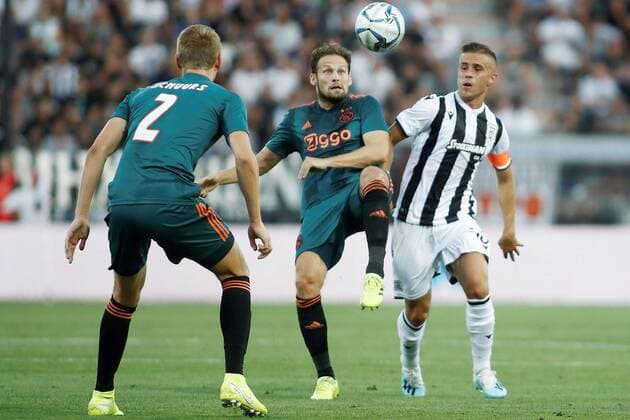 THESSALONIKI , 06-08-2019 , Stadio Toumba , Champions League third qualifying round season 2019-2020 , Daley Blind and Dimitri Pelkas during the game PAOK - Ajax. PAOK - Ajax  x4058928x Copyright: