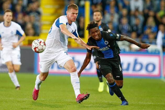 Dynamo s Mykyta Burda and Club s David Okereke fight for the ball during a game between Belgian soccer team Club Brugge and Ukrainian club Dynamo Kyiv, in the third qualifying round of the UEFA Champions League competition, Tuesday 06 August 2019 in Brugge. BRUNOxFAHY  x05639499x
